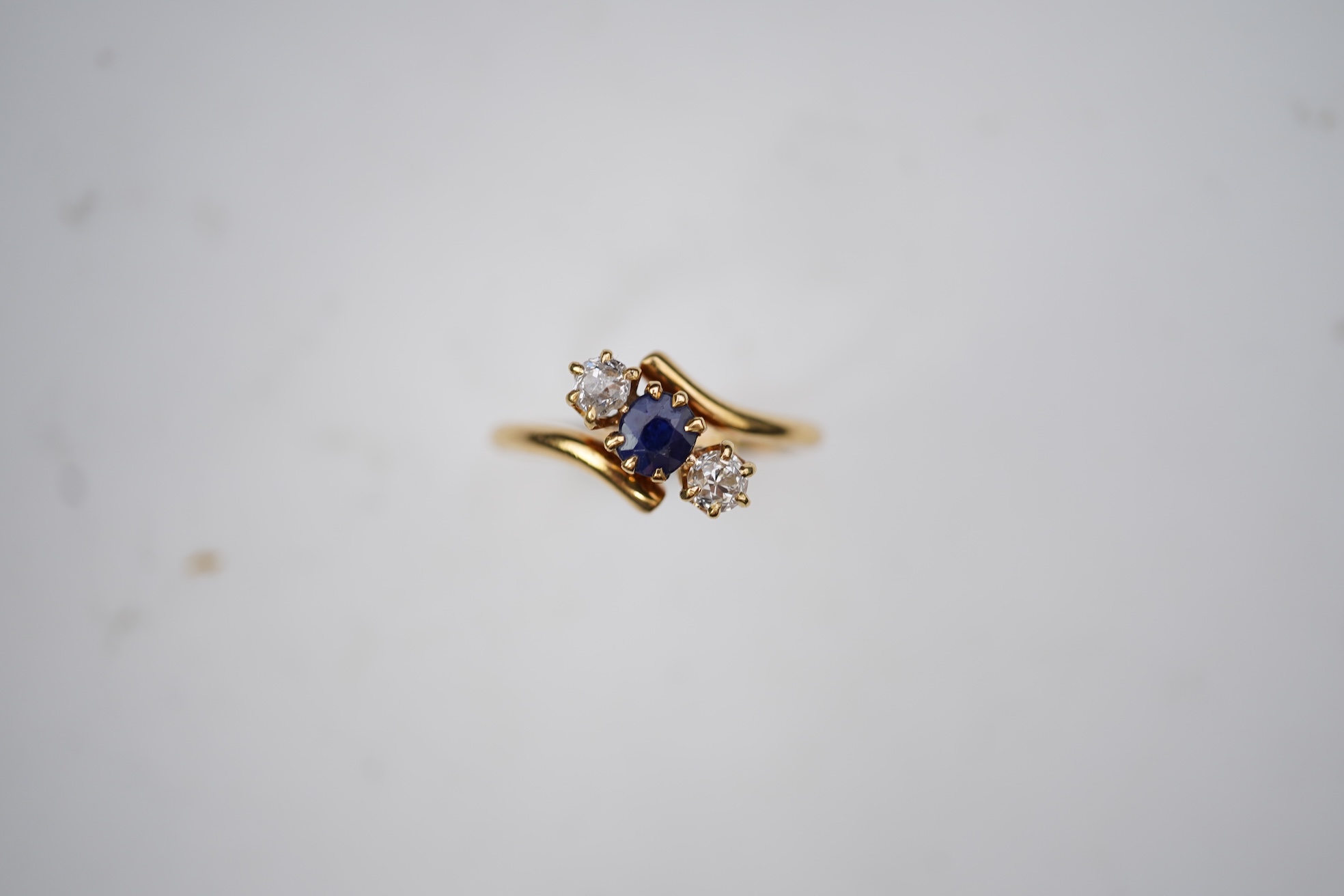 A sapphire and diamond three-stone ring, early 20th century